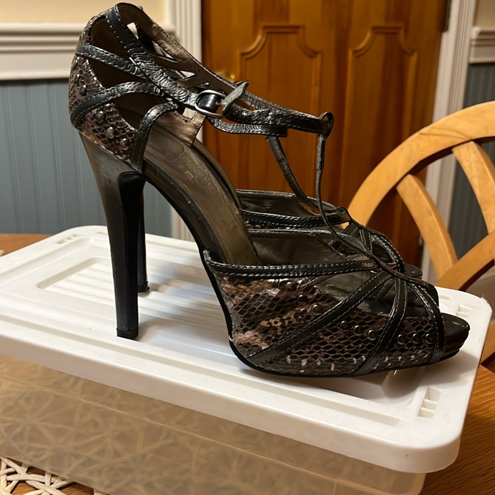 Well-worn Arden B stiletto open to platform ankle strap size 8